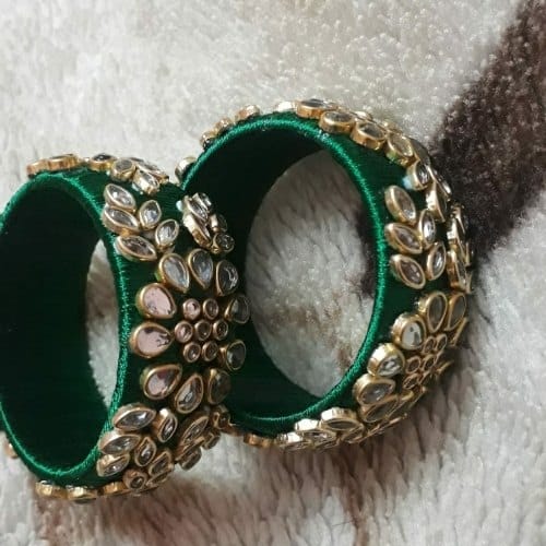 Emerald green silk bangles with kundan work