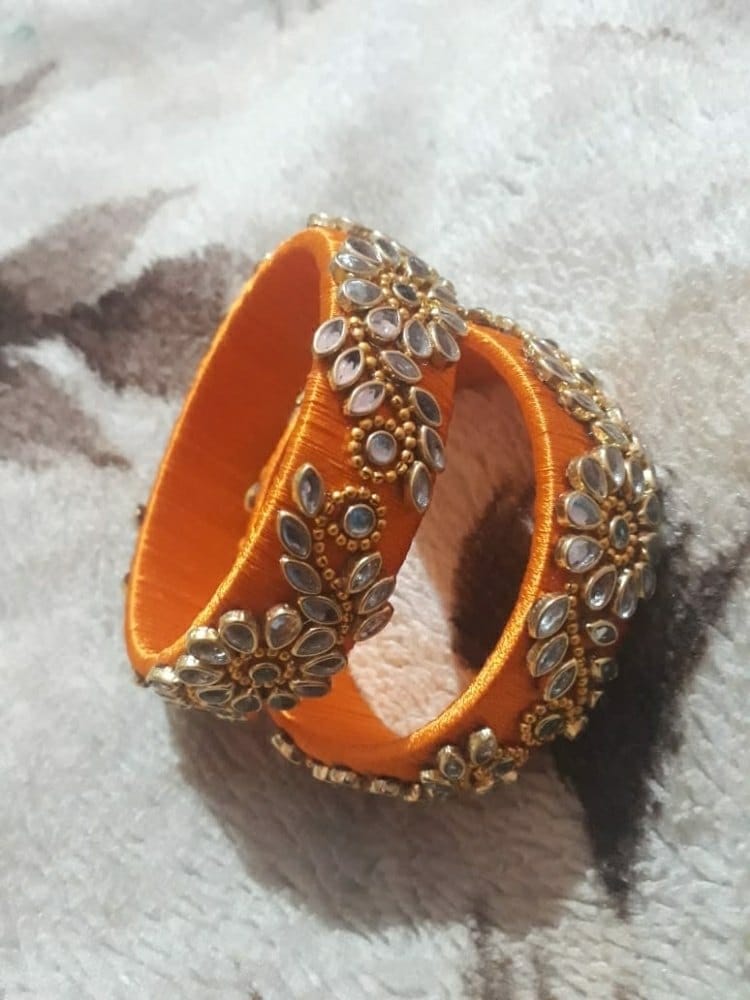 Orange silk bangles with kundan work