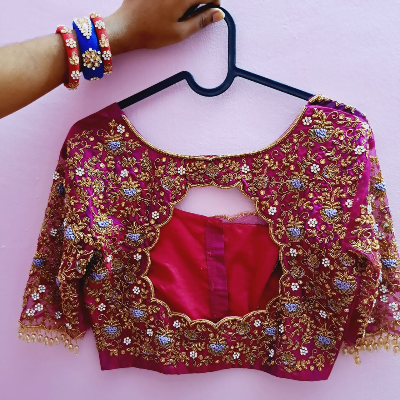 Elegant embroidered blouse with intricate Maggam work
