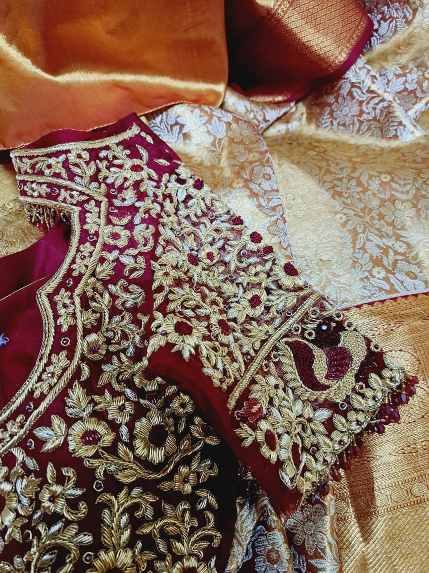 Burgundy blouse with detailed gold work