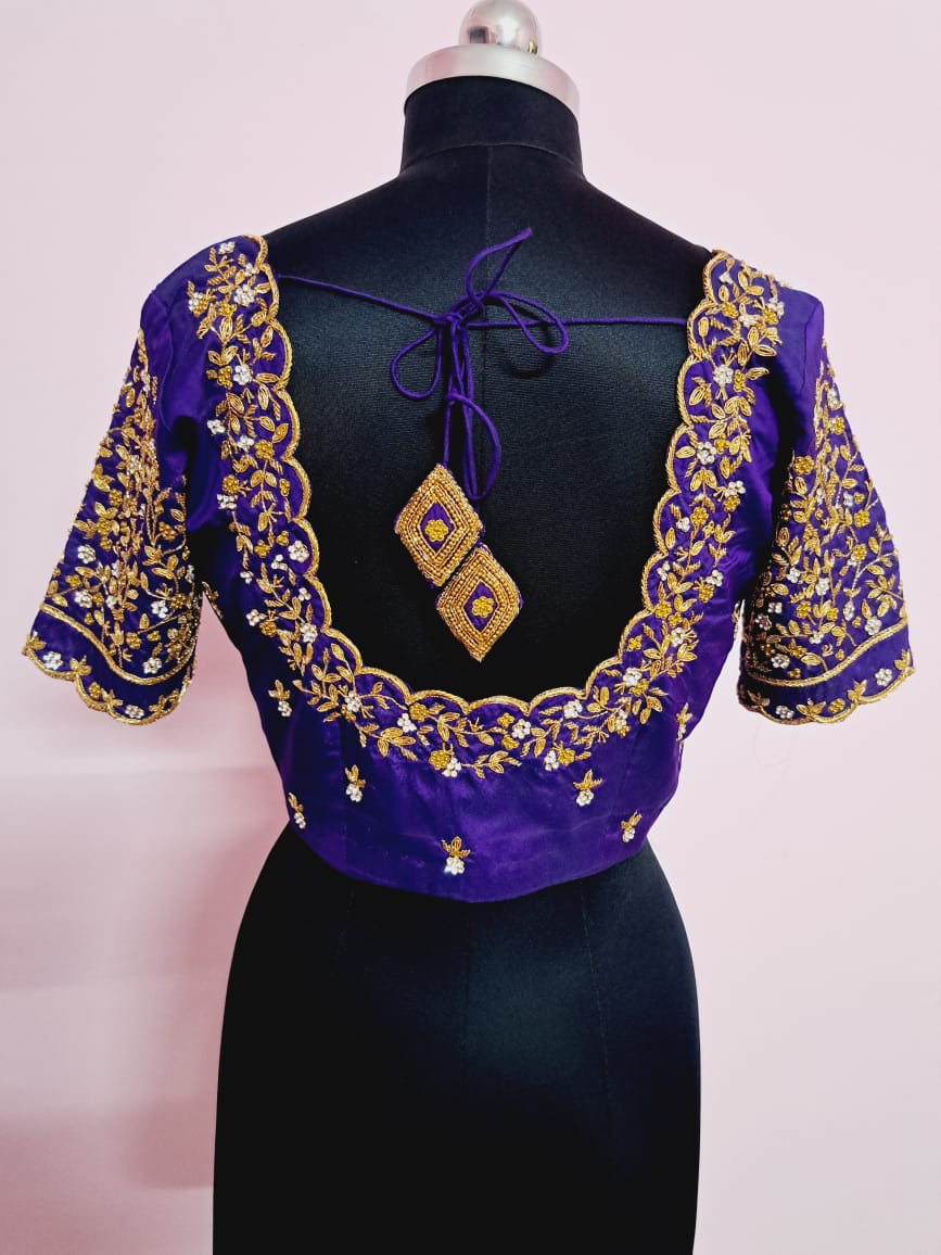 Purple blouse with circular back design